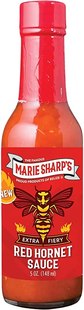 One of the standout features of Marie Sharp's Red Hornet Pepper Hot Sauce is its unique flavor. The blend of habanero peppers, carrots, onions, garlic, and key lime juice gives it a slightly sweet and tangy taste that's perfect for adding a little extra flavor to your meals.