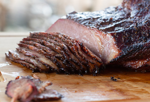 Smoking a beef brisket is one of the most iconic American BBQ traditions. It's a time-honored technique that requires patience, skill, and a bit of finesse. But don't let that intimidate you – with the right tools and knowledge, smoking a beef brisket can be a rewarding and delicious experience.